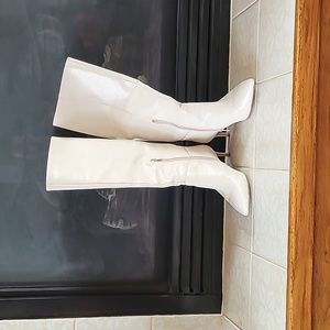 Antonio Melani ivory knee high leather boots with high heels.  Size 9